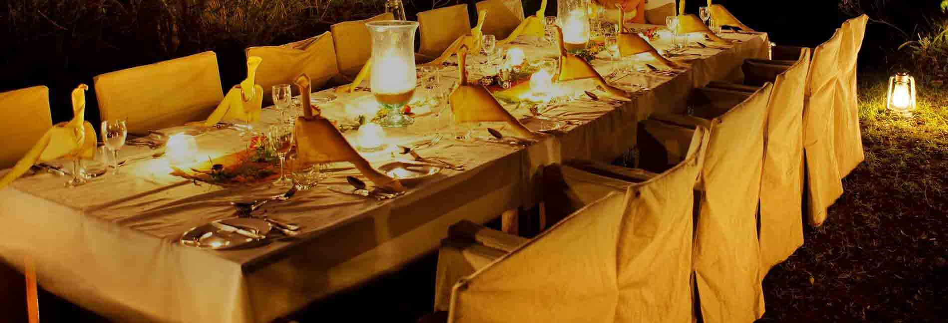 Fine dining experience at a gourmet restaurant in Kenya featuring elegant table settings and exquisite cuisine