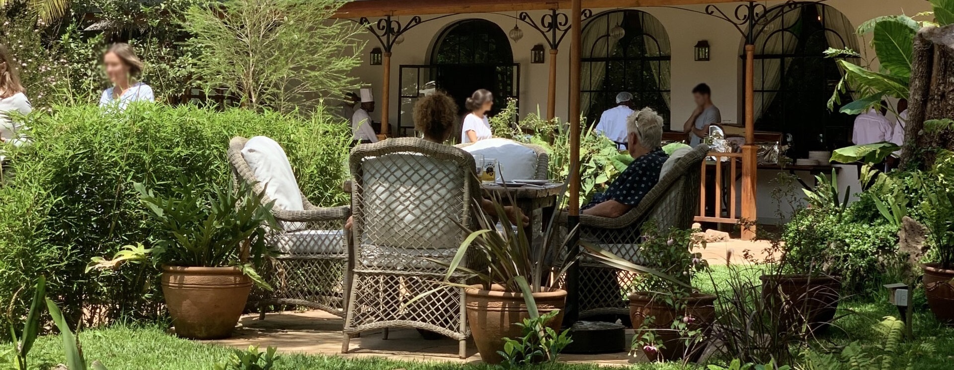 Elegant outdoor dining setup at Karen Blixen Restaurant in Nairobi.