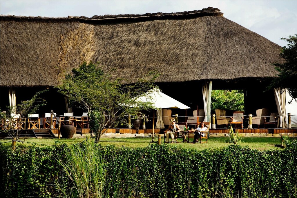 Luxury tented suite at Karen Blixen Camp in Masai Mara overlooking the Mara River